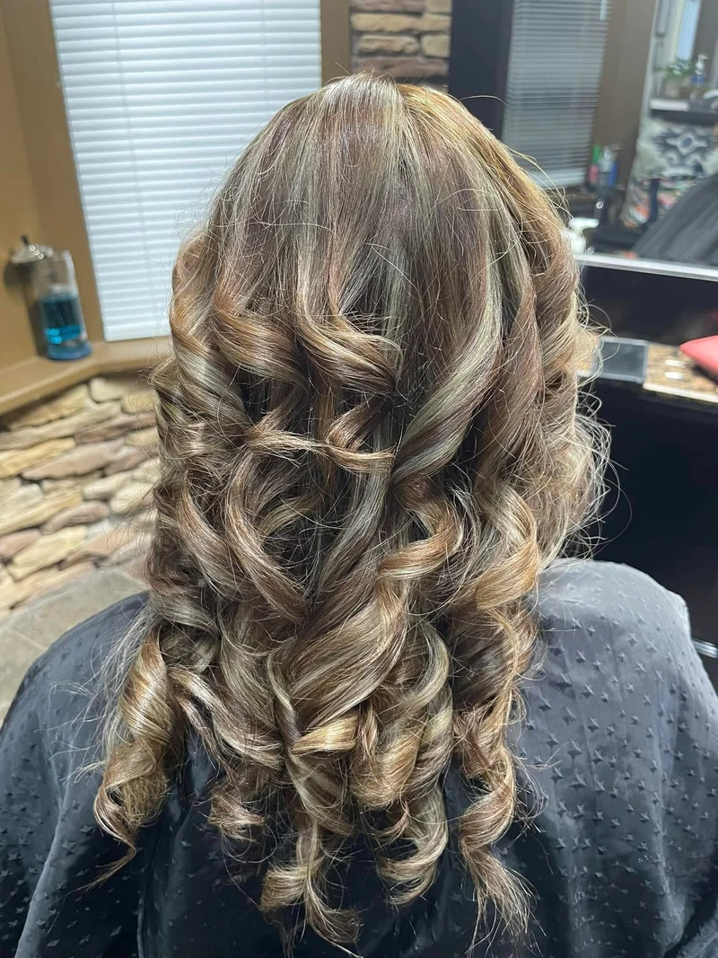 Blonde highlights and flowing curls by Adeth