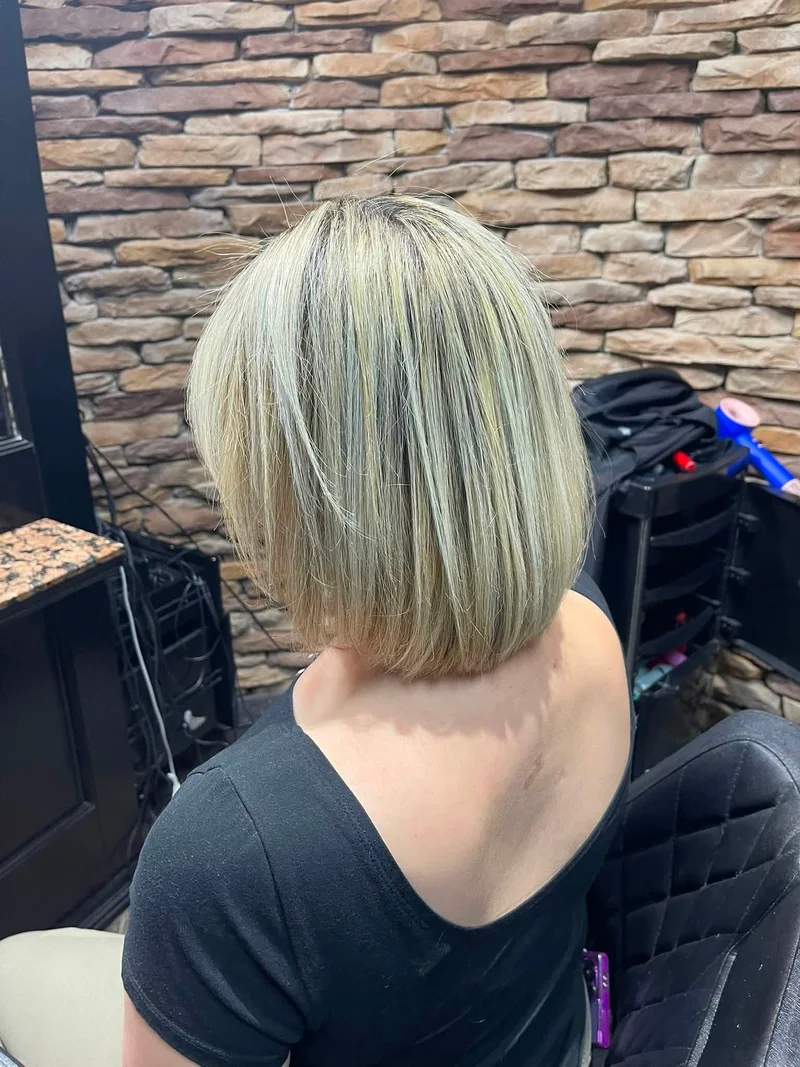 Blonde shoulder-length haircut at Innovations Beauty Salon